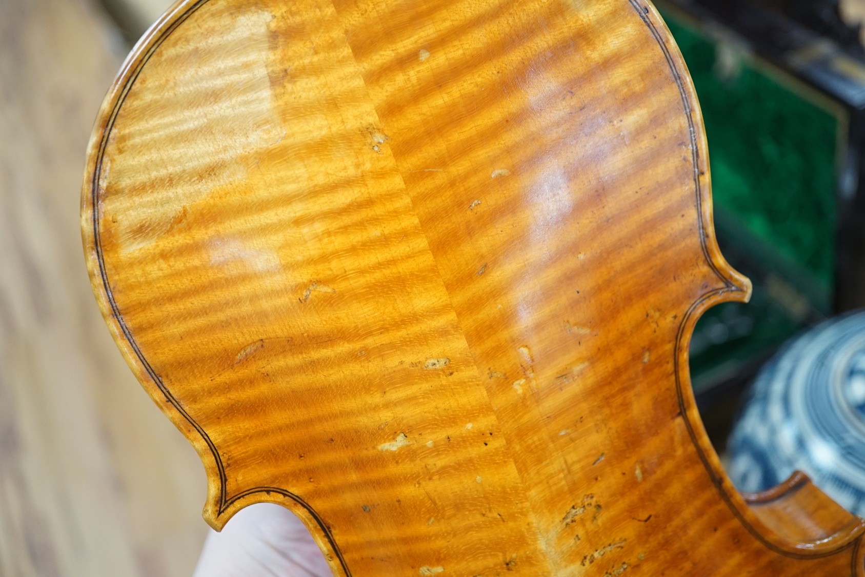 A cased violin, sound post loose